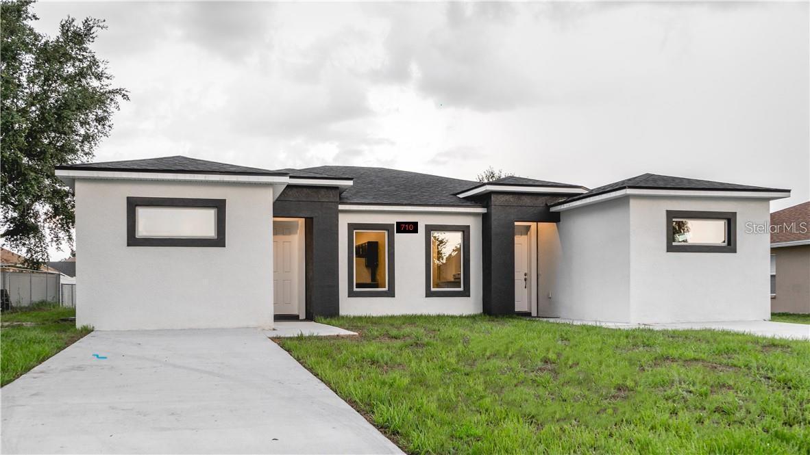 Excellent Investment Property Duplex, 2 Units. "Modern Style". OPEN and Spacious Floor Plan, 3 Bed 2 Bath ,on each side. Gorgeous Tile throughout, real wood cabinets, granite countertops.