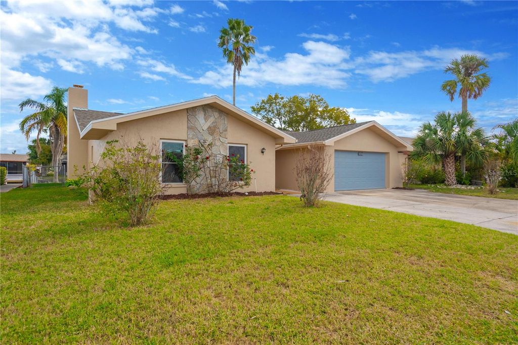Photo of 9840 San Sebastian Way, Port Richey, FL 34668 (MLS # O6367969)
