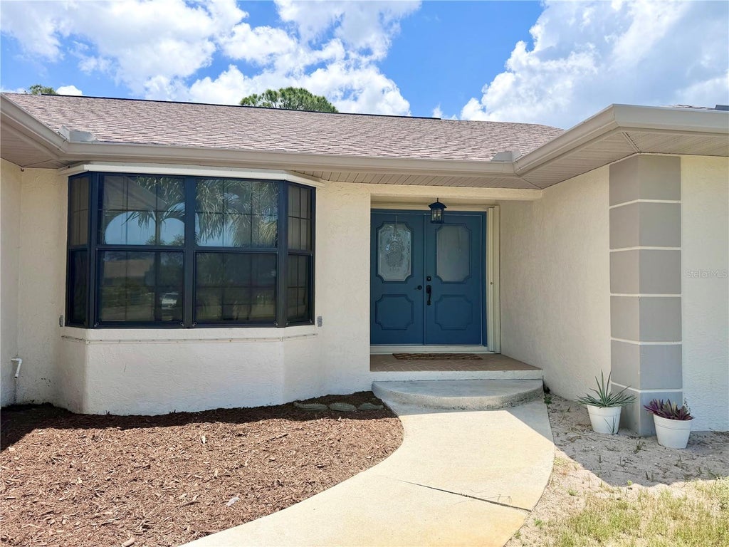 Photo of 1087 Bay Harbor Drive, Englewood, FL 34224 (MLS # C7527754)