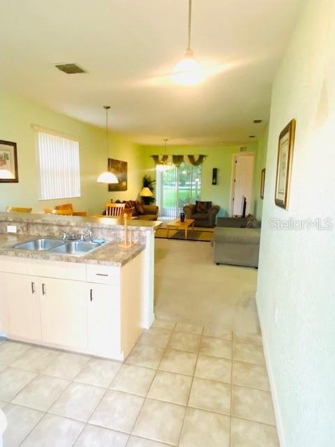 Photo of 4102 Lake Marion Golf Resort #4102, Poinciana, FL 34759 (MLS # L4964886)
