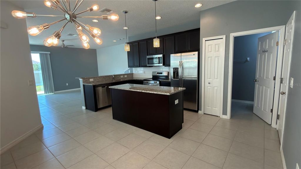 Photo of 2480 Sedge Grass Way, Orlando, FL 32824 (MLS # O6404618)