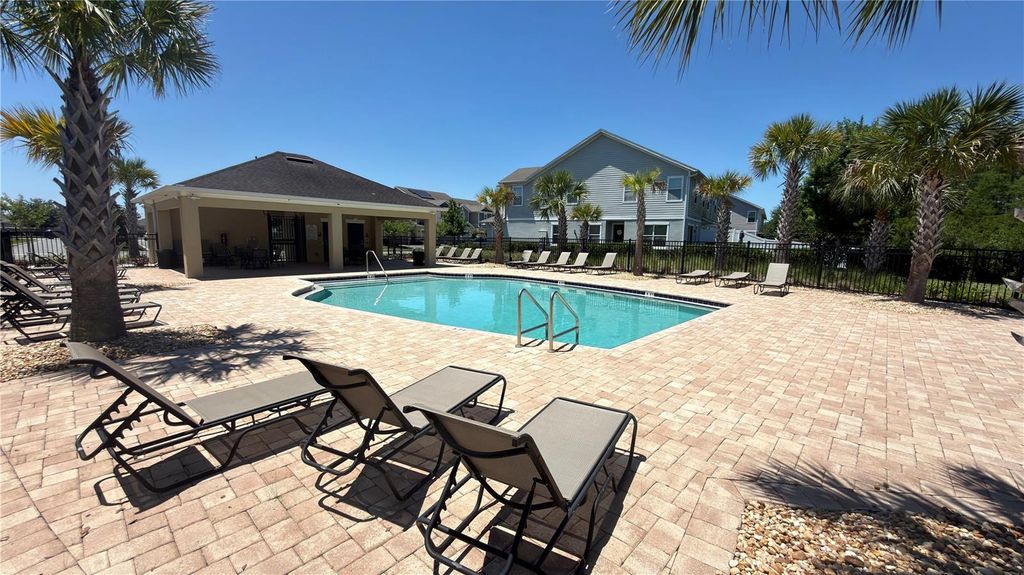 Photo of 2480 Sedge Grass Way, Orlando, FL 32824 (MLS # O6404618)
