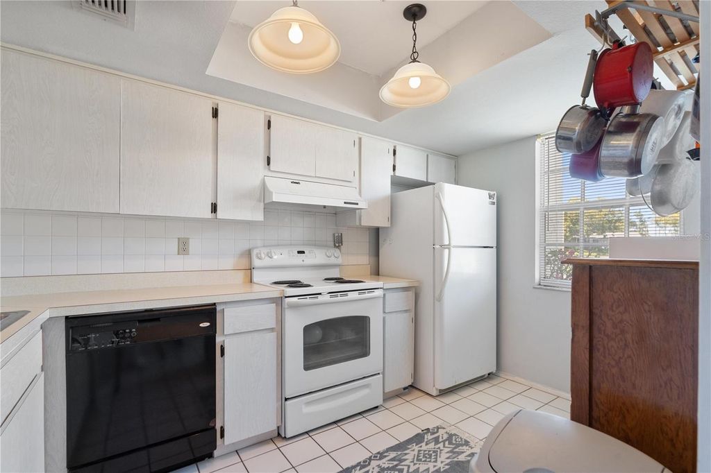 Photo of 11310 Carriage Hill Drive #4, Port Richey, FL 34668 (MLS # W7874068)