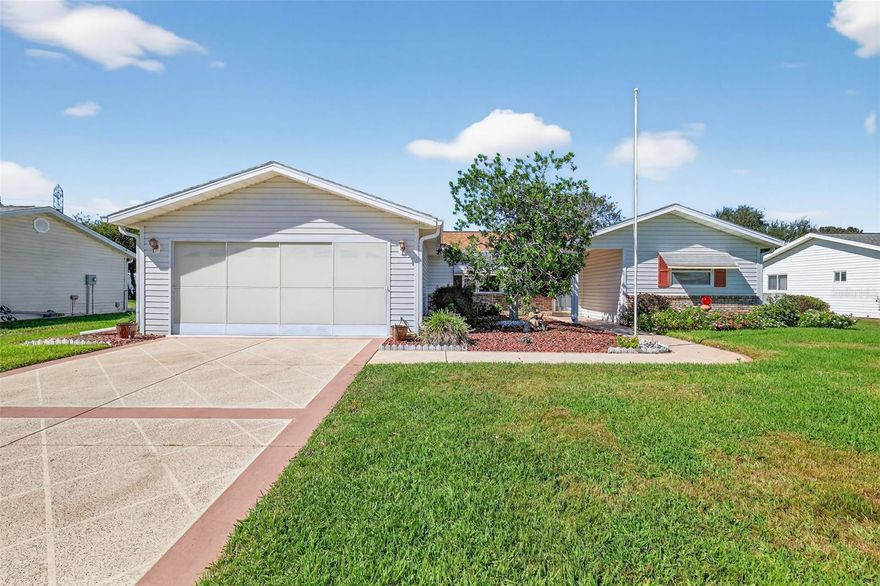 Welcome to  55+ LIVING at its BEST in SPRUCE CREEK SOUTH! This is  3/2 HOLLY MODEL with 1450 square feet plus a GLASS enclosed Lania. PEACE OF MIND as HVAC (2025), HT WATER HEATER (2025) and ROOF (2024 )---- ALL HAVE BEEN UPDATED!!!! You will find BEAUTIFUL KITCHEN CABINETRY  (soft close and pull out drawers),LIGHTING above the Kitchen cabinets, WHT appliances  and JETTA STONE countertops. The bathrooms also have JETTA STONE countertops as well. For added convenience there is an INSIDE LAUNDRY ROOM- Washer and Dryer are included and there is a Laundry tub as well. 3 SOLAR TUBES adorn this home providing opulent NATURAL LIGHT. There are CEILING FANS throughout as well. The Garage has a SCREEN DOOR  and there is a newer SIDE DOOR . The LANAI is enclosed with GLASS windows and has a separate A/C for comfort. Off the Lanai is a PORCH for additional space to relax! Located close to the VILLAGES and shopping for convenience!!!Make your appt to see this wonderful home in this great community today!!