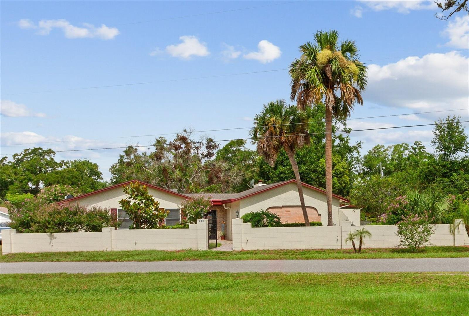 One or more photo(s) has been virtually staged. Charming Indoor Pool Home in the Heart of Historic Longwood. Step into classic Florida charm with this well-loved home, ideally positioned on a corner lot across from a serene park—formerly a golf course—now a protected green space with scenic trails, and a peaceful atmosphere.
Brimming with character, the home features vaulted wood ceilings, wood flooring, fresh neutral paint, and an abundance of natural light. The layout includes a formal dining area, a cozy living room, an open kitchen with granite countertops, a skylight, and a cheerful breakfast nook.
Glass sliders lead to a rare indoor pool—perfect for year-round enjoyment and entertaining. A flexible enclosed lanai offers even more living space and can be used as a bonus room, guest area, or home office.
The main suite includes a private skylight and refreshed en suite bath with updated mirrors and lighting. Additional rooms throughout the home provide options to suit your lifestyle.
Timeless in its appeal, the home has solid bones and a warm atmosphere, offering the perfect canvas for your personal touch.
Enjoy a newer roof (less than one year old), screened two-car garage, interior laundry, and NO HOA. The surrounding neighborhood continues to evolve, with the former golf course reimagined as a peaceful natural retreat—complete with winding trails, open green spaces that invite connection with nature.
Conveniently located minutes to I-4, Uptown Altamonte, Cranes Roost, Reiter Park, top-rated Seminole County schools, shopping, dining,major hospitals and so much more!
Come explore the possibilities in one of Historic Longwood’s most charming and evolving neighborhoods-schedule your showing today!