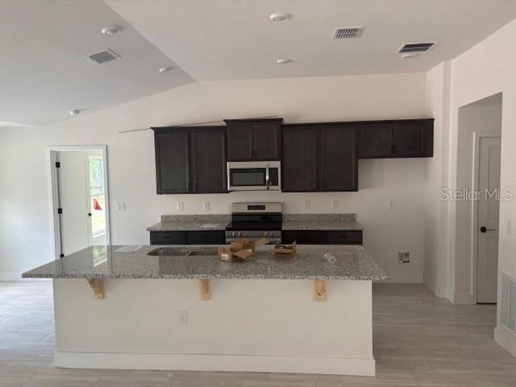 Photo of 12815 SW 94th Lane, Dunnellon, FL 34432 (MLS # OM723586)