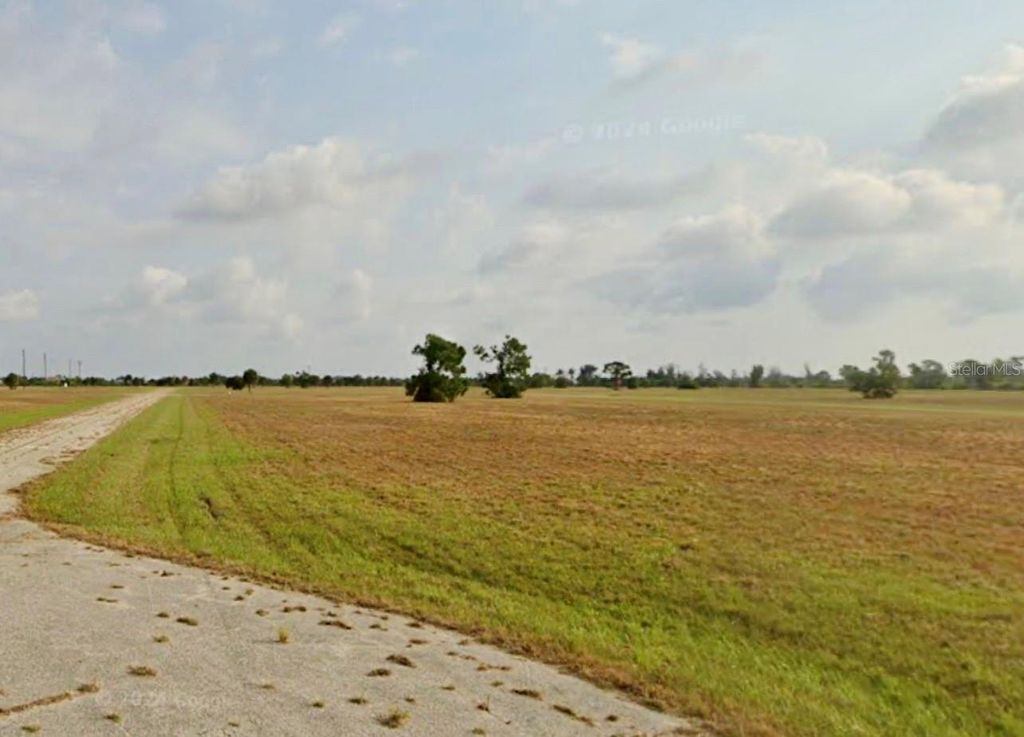 Photo of 4 Calamondin Way, Placida, FL 33946 (MLS # O6313245)