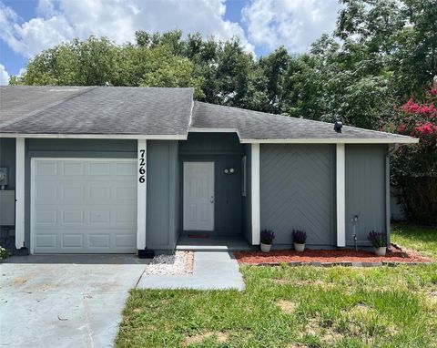 Photo of 7266 Oak Meadows Circle, Orlando, FL 32835 (MLS # O6318144)
