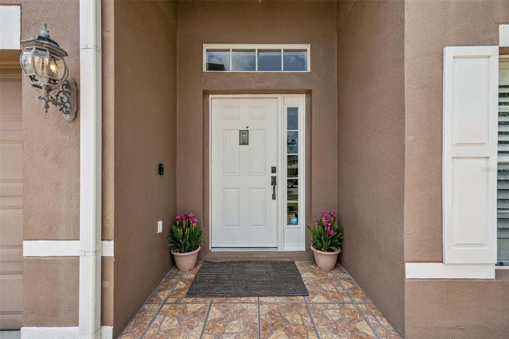 Photo of 14580 Saint Georges Hill Drive, Orlando, FL 32828 (MLS # O6428435)
