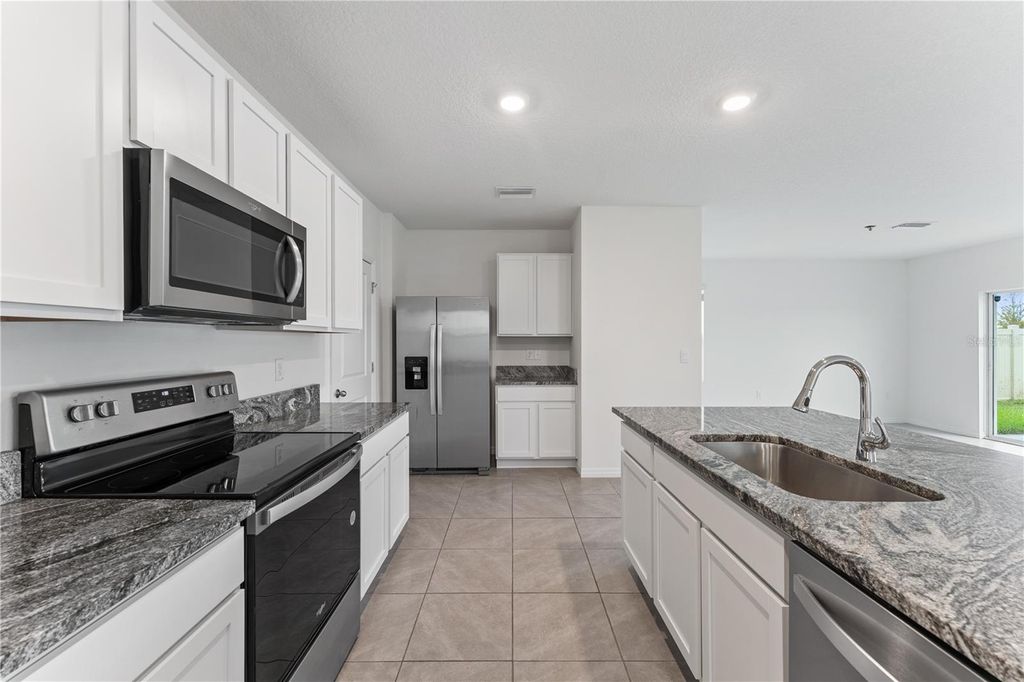 Photo of 30753 Penny Surf Loop, Wesley Chapel, FL 33545 (MLS # TB8426488)