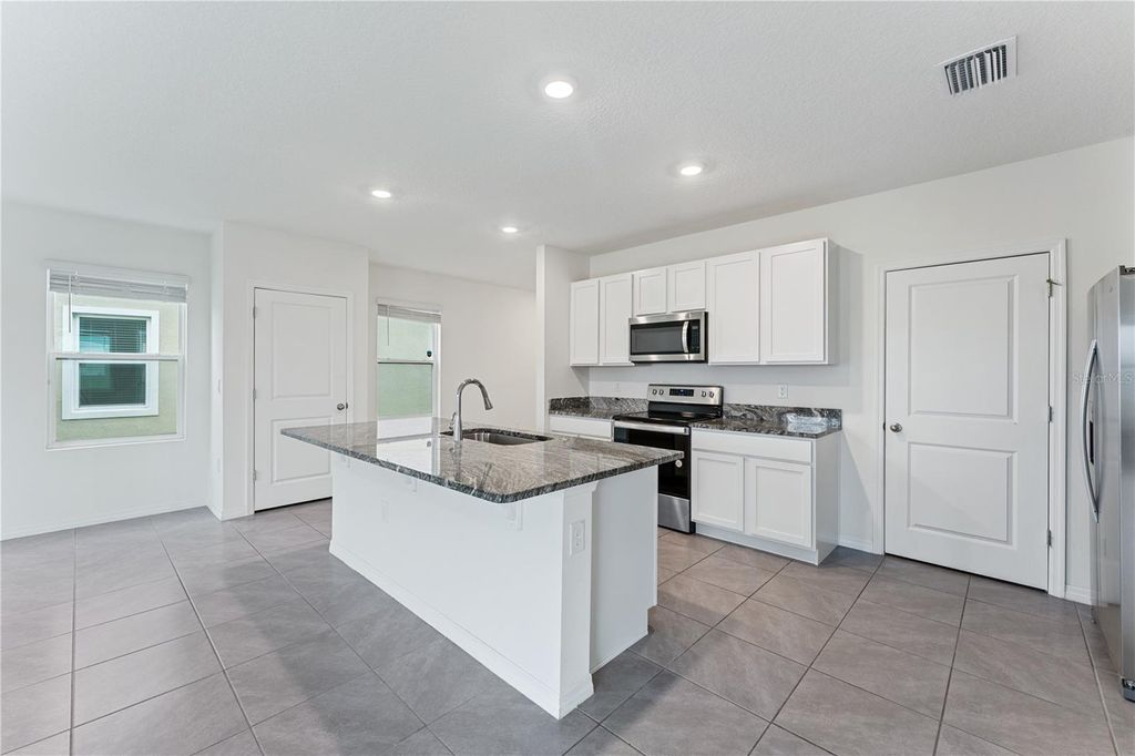 Photo of 30753 Penny Surf Loop, Wesley Chapel, FL 33545 (MLS # TB8426488)