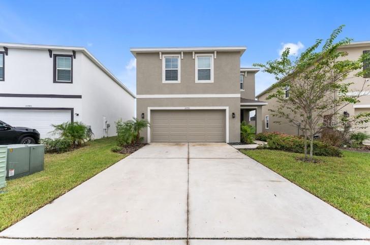 STUNNING 4-bedroom, 2.5-bath residence in the sought-after Epperson community of Wesley Chapel. Offering 2,260 sq. ft. of thoughtfully designed living space, this two-story home blends style, comfort, and convenience for today’s modern lifestyle.
Step inside to a bright, open main level where the kitchen, dining, and living areas come together seamlessly. The chef-inspired kitchen boasts sleek quartz countertops, an oversized island perfect for gatherings, and abundant cabinetry for storage. A chic powder bath, two versatile storage closets, and access to a fully fenced backyard with no rear neighbors complete the first floor.
Upstairs, you’ll find a spacious loft ideal for a home office, playroom, or media space. The private owner’s suite offers a large walk-in closet and a spa-like ensuite bath, while three additional bedrooms provide plenty of space for family or guests.
Living in Epperson means more than just a home—it’s a lifestyle. Residents enjoy exclusive access to the 7-acre Crystal Lagoon, where you’ll find sandy beaches, swim-up bars, kayaking, and year-round events such as live concerts and family movie nights. Beyond the lagoon, the community’s prime location puts you just minutes from KRATES at the Grove, Tampa Premium Outlets, I-75, and top-rated schools.
Whether you’re relaxing at home, enjoying endless amenities, or exploring all that Wesley Chapel has to offer, this property is the perfect place to call home. Schedule your private showing today!