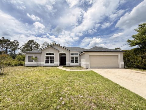 Photo of 34 Roxanne Lane, Palm Coast, FL 32164 (MLS # FC318017)