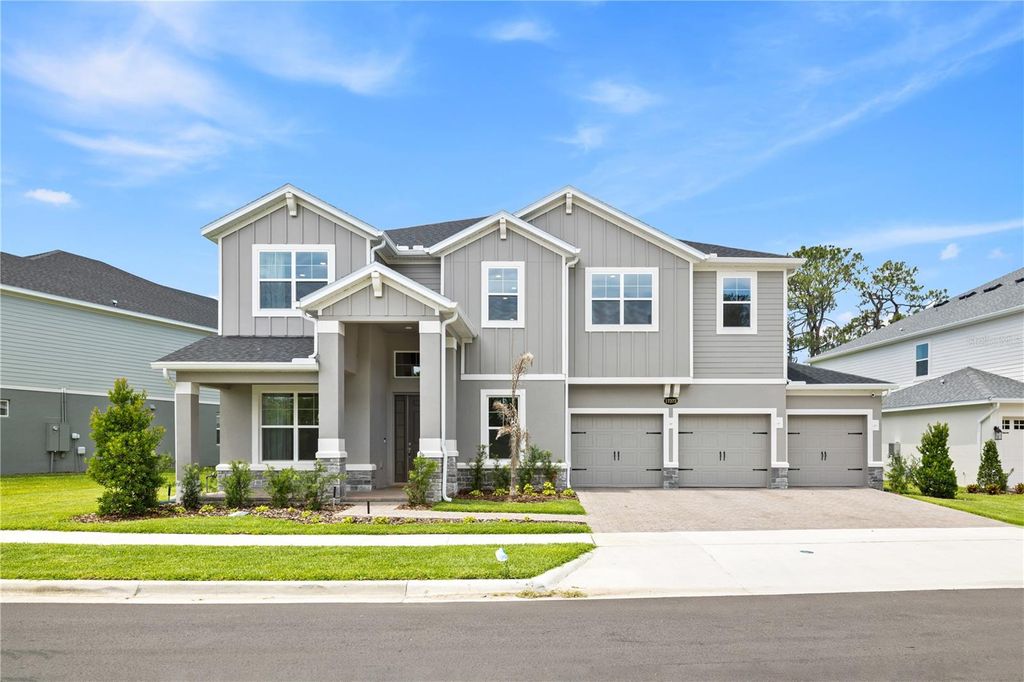 Photo of 17372 Glossy Pomelo Way, Winter Garden, FL 34787 (MLS # O6406639)