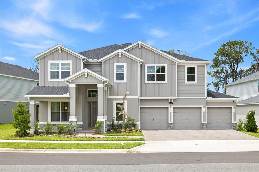 Luxury lake view living at its finest in the heart of Horizon West Ovation.

Welcome to one of the most impressive and exclusive homes in the area. This stunning nearly brand new residence offers the largest and most prestigious floor plan built by the builder, featuring 5 spacious bedrooms, 5 full bathrooms, 1 powder bath, and nearly 5,000 sqft of refined living space designed with elegance, comfort, and functionality in every detail.

Situated on an oversized premium homesite with exceptional spacing between neighboring homes, this property delivers a rare sense of privacy, tranquility, and open luxury that is almost impossible to find in Central Florida. The home is positioned with breathtaking rear lake and conservation views, creating an incredible atmosphere of peace and exclusivity. There is also potential to build a private deck and further enhance the outdoor lake lifestyle experience.

Built with top tier finishes and upgrades identical to the builder’s model home, every space in this residence was carefully designed to impress. The home features an incredible open concept layout, expansive living spaces, soaring ceilings, premium flooring, designer finishes, and a spectacular gourmet kitchen perfect for entertaining and everyday luxury living.

The bedrooms are exceptionally spacious, while the oversized laundry room is filled with cabinetry and includes a utility sink for convenience and organization. The owner’s suite is a true masterpiece and private retreat, surrounded by an extended balcony overlooking the lake and conservation views, creating the perfect setting to relax while enjoying breathtaking sunsets and even Disney fireworks at night.

This home offers the perfect combination of luxury, space, privacy, nature, and location. Positioned in one of the fastest growing and most desirable communities in Central Florida, Horizon West at Ovation, the property is located only about 10 minutes from Disney, with easy access to shopping, restaurants, entertainment, major highways, and top rated schools.

Opportunities like this are extremely rare. Do not miss the chance to own one of the finest luxury lake view homes in Horizon West.
