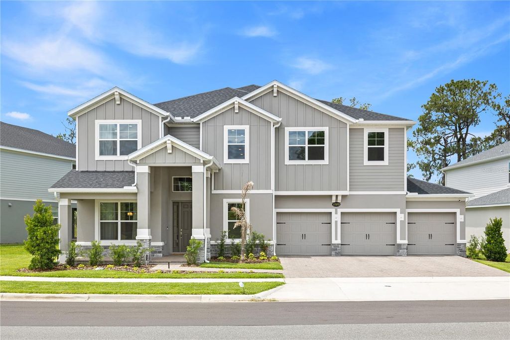 Photo of 17372 Glossy Pomelo Way, Winter Garden, FL 34787 (MLS # O6406639)