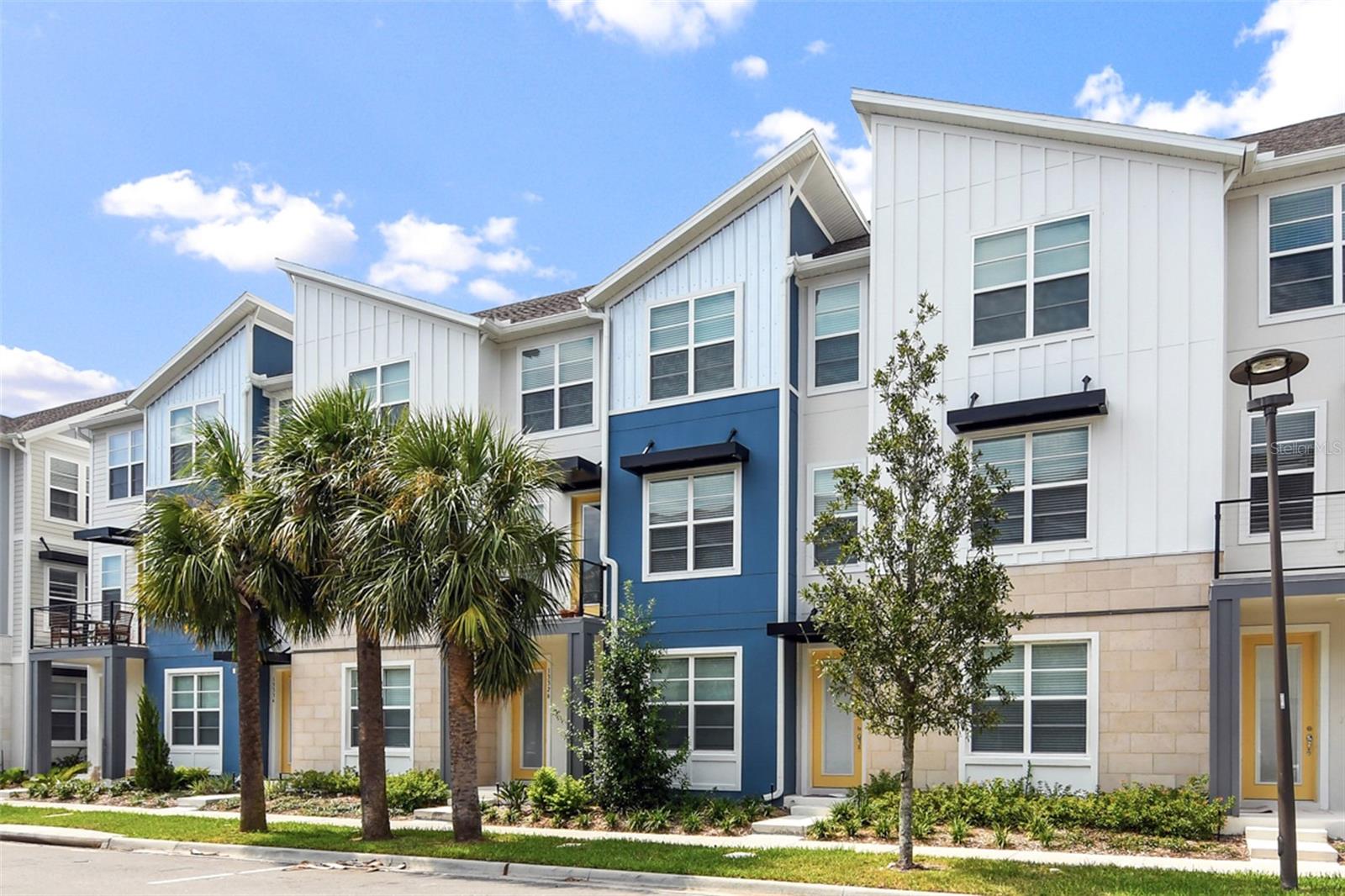 FULLY UPGRADED, LAUREATE PARK LUXURY Townhome in a perfect location at the center of all the community amenities. This rare townhome has 3 bedrooms with 3 private on-suite bathrooms and a guest half bath. The open floor plan has tall ceilings and plenty of windows that flood every room with natural light. Gorgeous design with high-end finishes throughout, including an oversized quartz island, upgraded appliances, custom tile backsplash, modern tile floors, plush new carpeting, and two renovated bathrooms. The spacious primary suite includes walk-In closets, a SPA bathroom featuring FRAMELESS SHOWER, double sinks, shaker style cabinets, quartz counters, upgraded faucets and hardware, and a rain shower head. This home is a MUST SEE and in a Prime location - walking distance to the pools and Canvas Restaurant! Laureate Park is Lake Nona's premier community which includes 1GB fiber internet, resort style pools, fitness center, many beautiful parks, lakes, 40% green space and A-rated schools. Nearby are Lake Nona's Medical City, Town Center, USTA, KPMG, 471 expressway and plenty of retail shopping.
