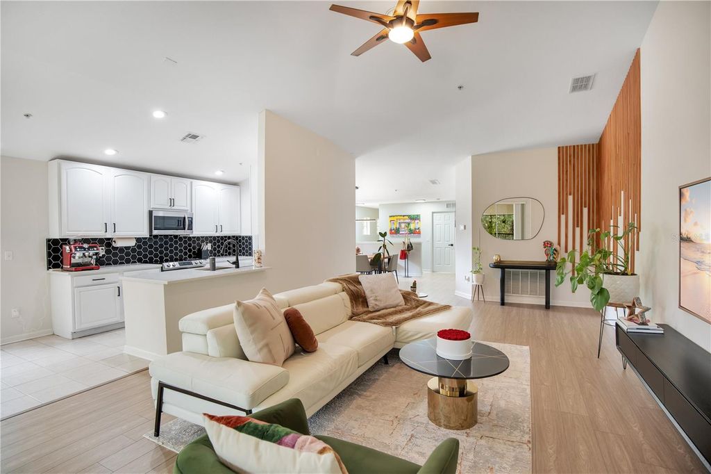 Photo of 6440 Axeitos Terrace #110, Orlando, FL 32835 (MLS # O6418283)