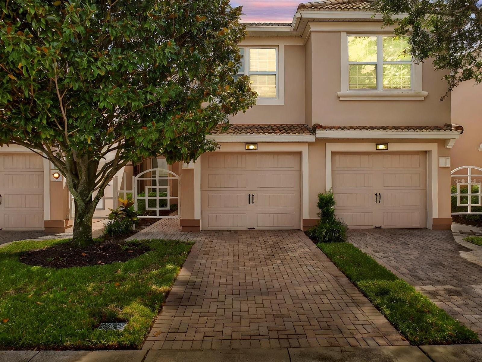 Welcome to Bella Trae, a gated community in the heart of Davenport where comfort and convenience come together. This first-floor condo is being offered fully furnished and has a peaceful water view you can enjoy from your screened-in lanai—a perfect spot for your morning coffee or evening wind down.
Inside, you’ll find an open layout that makes the living room, dining room, and kitchen flow easily together. The kitchen is bright and inviting with stainless steel appliances, granite countertops, and a dining nook where you can take in the view while you eat.
The primary bedroom also looks out over the water and includes a spacious walk-in closet along with a bathroom featuring dual sinks and a walk-in shower. The split floor plan gives everyone their own space, with a guest bedroom and nearby bath on one side and a third room that works perfectly as another bedroom or an office. Plus, you’ll have the convenience of an attached one-car garage.
Living in Bella Trae means enjoying a resort-style clubhouse, zero-entry pool, spa, fitness center, billiards room, tennis courts, putting green, community grills, and more. Your HOA dues cover cable, internet, pest control, and lawn care, so you can spend less time on chores and more time enjoying everything the community has to offer.
You’ll also love being close to golf courses, restaurants, shopping, and the theme parks, making this condo a wonderful place to call home—whether full-time or as a Florida getaway.