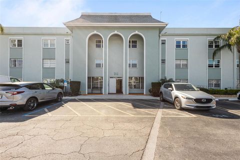 Photo of 1706 Belleair Forest Drive #202, Belleair, FL 33756 (MLS # TB8482356)