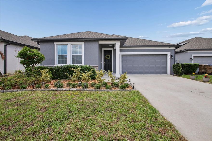 Welcome to this better-than-new, well-maintained home built in 2022, with covered and screened lanai and a large fenced backyard, updated with BRICK PAVERS and STONES! This charming property provides a spacious layout with modern finishes and plenty of natural light throughout. The chef-inspired kitchen boasts quartz countertops, a large island, step-in pantry and a flex space (that can be converted into a 4th room) with views of the pavered backyard. The large primary bedroom is located right off the kitchen with an ensuite bath featuring dual vanities, a step-in-shower and a walk in closet. Two secondary bedrooms and an oversized laundry with ample storage are located in the front of the house. Located in a serene neighborhood with a lake, the Sunbrooke community provides several amenties, including a clubhouse, pool and playground. This home is just minutes from Lake Nona with convenient access to the turnpike, the 417, local amenities and attractions!