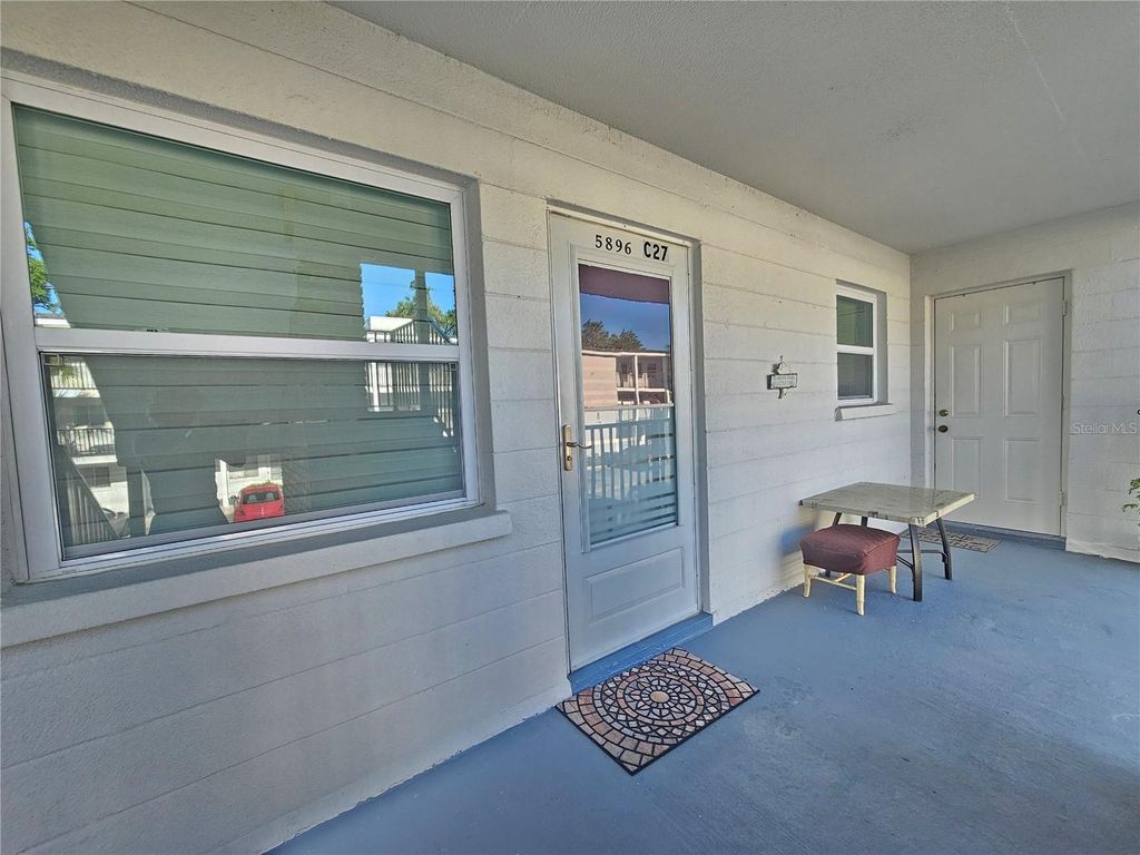 Photo of 5896 Palm Lane #C27, Bradenton, FL 34207 (MLS # A4690971)