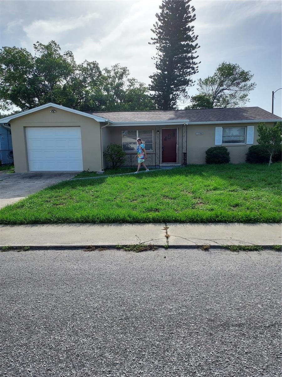 Photo of 1240 Chelsea Lane, Holiday, FL 34691 (MLS # TB8561052)