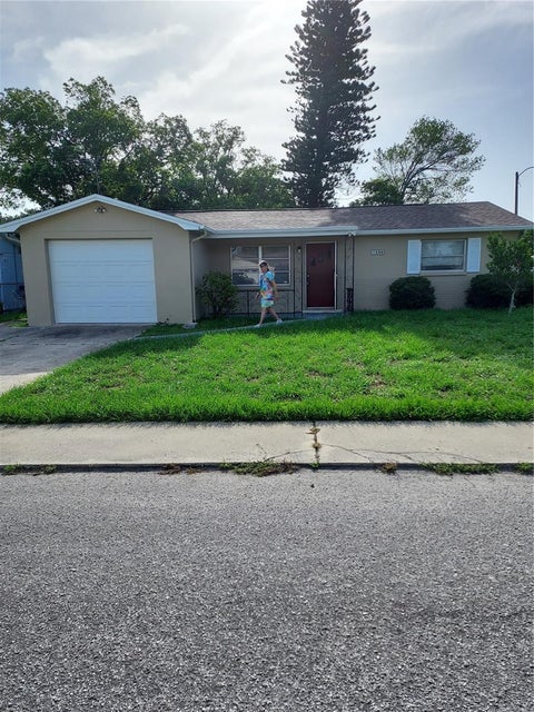Photo of 1240 Chelsea Lane, Holiday, FL 34691 (MLS # TB8561052)