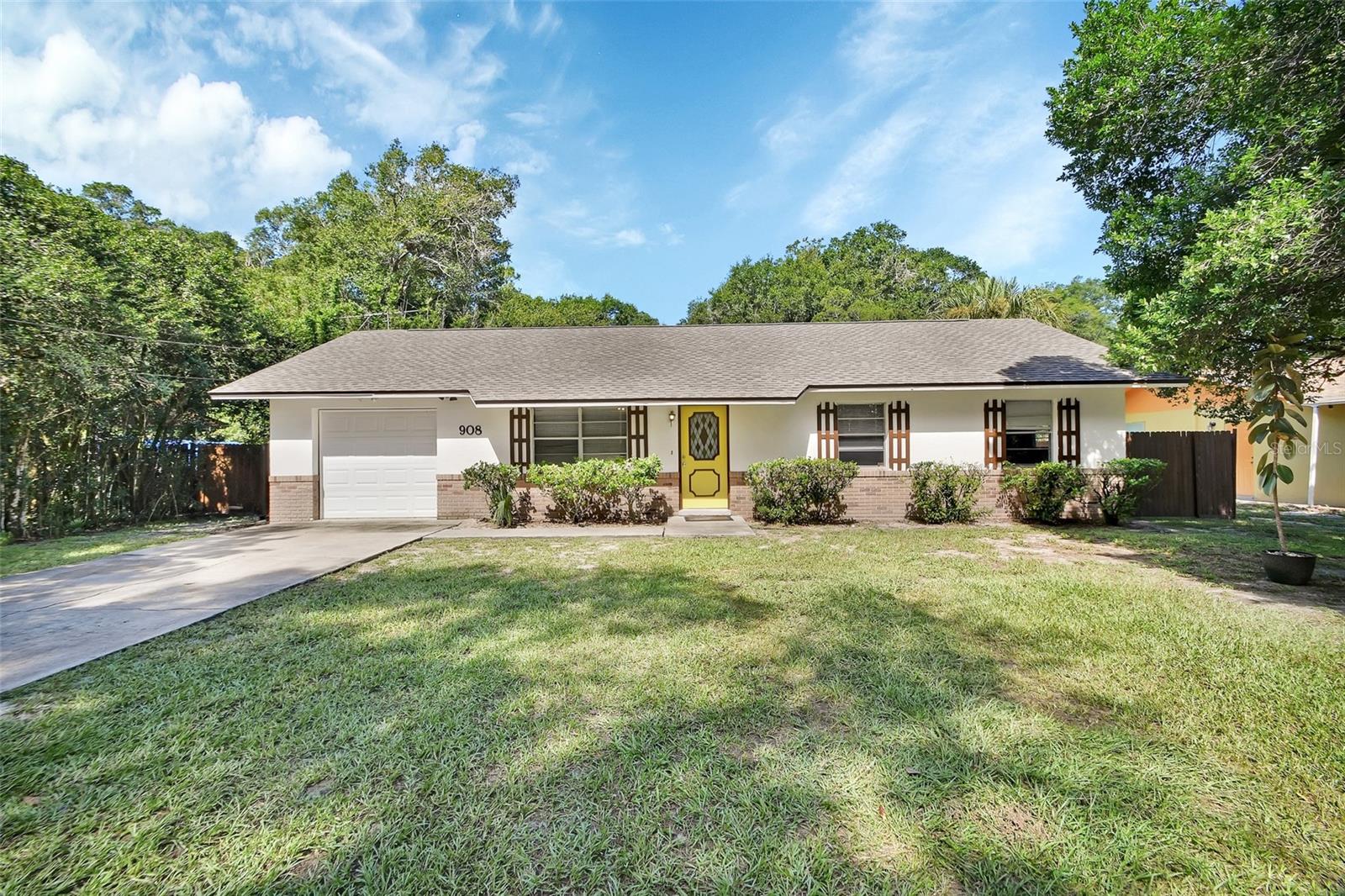 Perfect Starter, Snowbird Retreat, or Downsizing Opportunity! Whether you're a first-time homebuyer, looking to downsize, or searching for the ideal winter getaway, this updated home in DeLand checks all the boxes. Situated on a spacious 0.59-acre lot, this 3-bedroom, 2-bath home features a 1-car garage and plenty of room to spread out—inside and out. Enjoy a bright, eat-in kitchen and a generously sized family room, all with luxury vinyl plank flooring throughout and a freshly painted interior. The primary suite offers a private, updated en suite bath with a large tiled walk-in shower, while all bedrooms include oversized closets. Relax on your 10x15 screened and covered back porch, perfect for morning coffee or evening unwinding. The fully fenced backyard offers 6-foot privacy fencing, and there’s even a shed for extra storage. Additional highlights include: NEW ROOF (2024) Updated AC, hot water heater, water softener, foam-insulated attic for improved energy efficiency, ceiling fans in every room and inside laundry room. Benefit from the prime location—only 2.6 miles from Historic Downtown DeLand, offering an array of charming shops, dining, a brewery, wine bar, antique stores, and Stetson University. Enjoy quick access to medical center, grocery stores, Starbucks, and I-4, for an easy commute to Daytona, Orlando, Lake Mary, and the beaches too. Call for your personalized showing today!