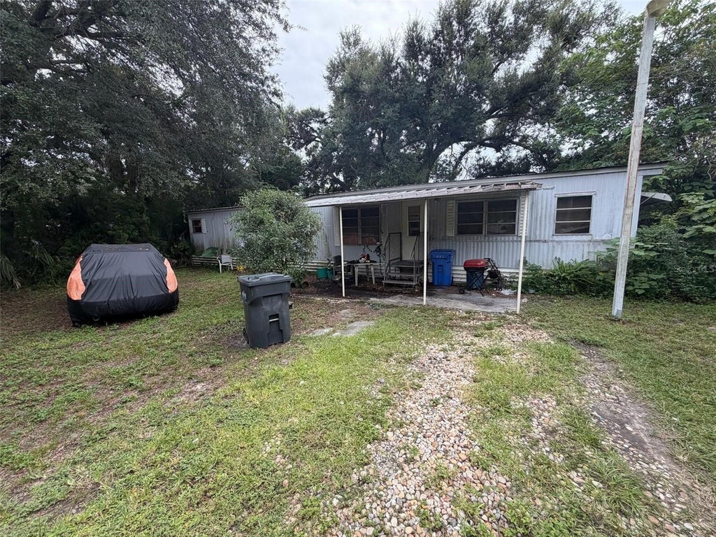 Photo of 7023 50th Avenue S, Tampa, FL 33619 (MLS # O6447880)