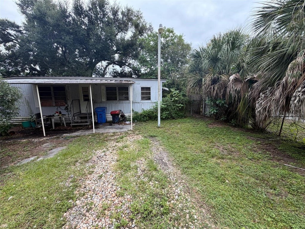 Photo of 7023 50th Avenue S, Tampa, FL 33619 (MLS # O6447880)