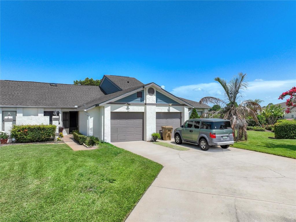 Photo of 62 Lakepointe Circle, Kissimmee, FL 34743 (MLS # O6423673)
