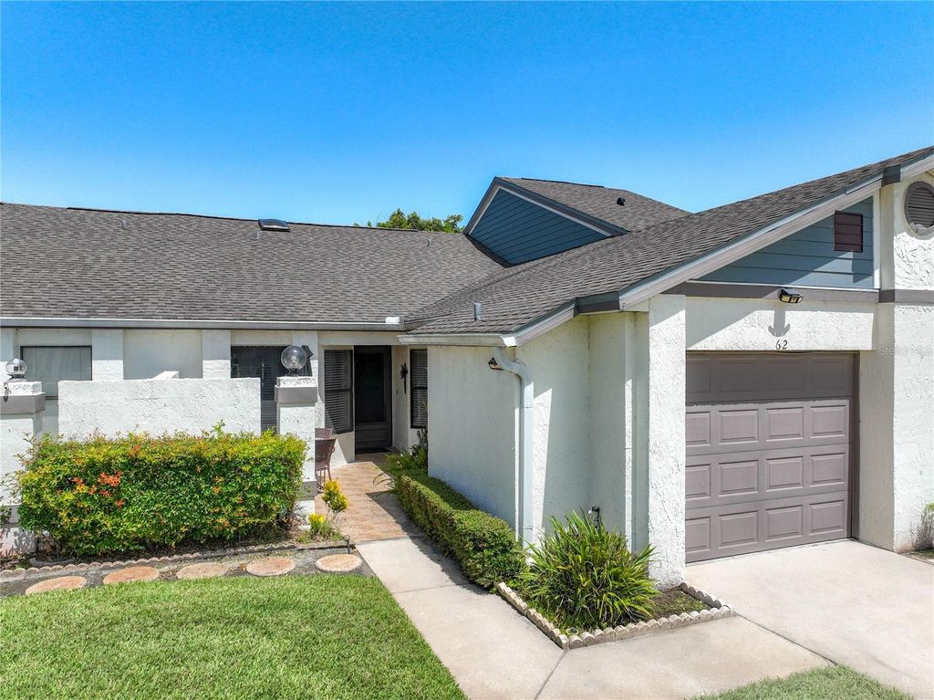 Photo of 62 Lakepointe Circle, Kissimmee, FL 34743 (MLS # O6423673)