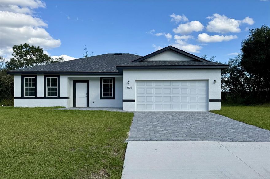 Bring the family to this Brand New 4 bedroom/3 bath Home in Marion Oaks with NO HOA! High & dry. No Flood Zone. If you can't find a Mother-in-law suite, Here's the next best- AN ENSUITE W/ ITS OWN BATH & HUGH WALK IN CLOSET. Great for a home office! This Open Floor Plan offers a Covered FRONT Porch and Covered Lanai off the kitchen.  Tall ceilings throughout ARE 9”4”. Tile throughout! No carpet! Builder Warranty. Ask about a FHA a 4.99 PERCENT INTEREST RATE , 30 year fixed rate OR Lender Paid Closing Costs. Call agent for further details.  This home is eligible USDA, VA, FHA!. No back neighbors ever-county owned property behind!  PAVER BRICK PATIO & DRIVEWAY.
New Elementary school is complete and New High School 2026. Close to Shopping, Medical, I75 to Orlando, Restaurants & More... Marion Oaks amenities include a community center with a library, auditorium, and recreational facilities like a splash pad, fitness center, and sports courts for basketball, tennis, pickleball, and volleyball. Outdoor amenities feature parks, playgrounds, and walking/biking trails, and the community also provides convenient access to shopping and dining, with nature areas like the Cross Florida Greenway nearby. SCHEDULE YOUR TOUR TODAY!