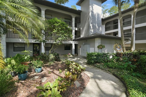 Photo of 3399 Mermoor Drive #105, Palm Harbor, FL 34685 (MLS # TB8530794)