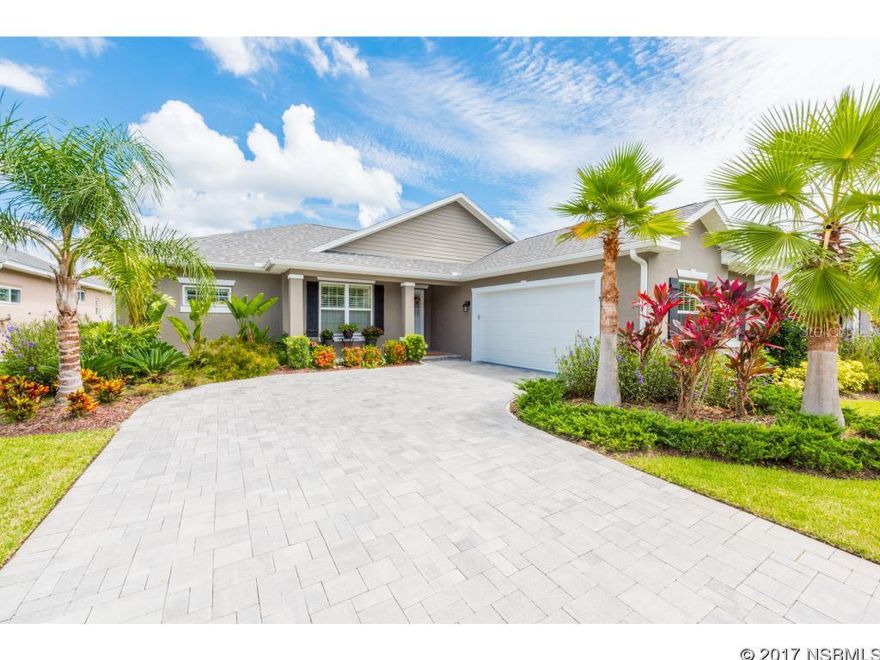 Newly built home in 2014 with beautiful curb appeal. Welcome to this comfortable New Smyrna Beach home waiting for you. Enter from the front door to be welcomed to your dining room and living room. Love entertaining? This is your perfect spot! With your kitchen and eat-in facing the living area, you'll never miss out if you're the one in the kitchen. Take the entertainment outside your glass sliding doors to the beautifully paved porch with a shade when the sun is not quite set. Plenty of yard space for a good game of corn hole or horseshoes. Your master bedroom is an oasis to relax with another set of glass sliders looking out to the backyard. Tile throughout with carpet in your bedrooms. This home awaits you! ;Water: City