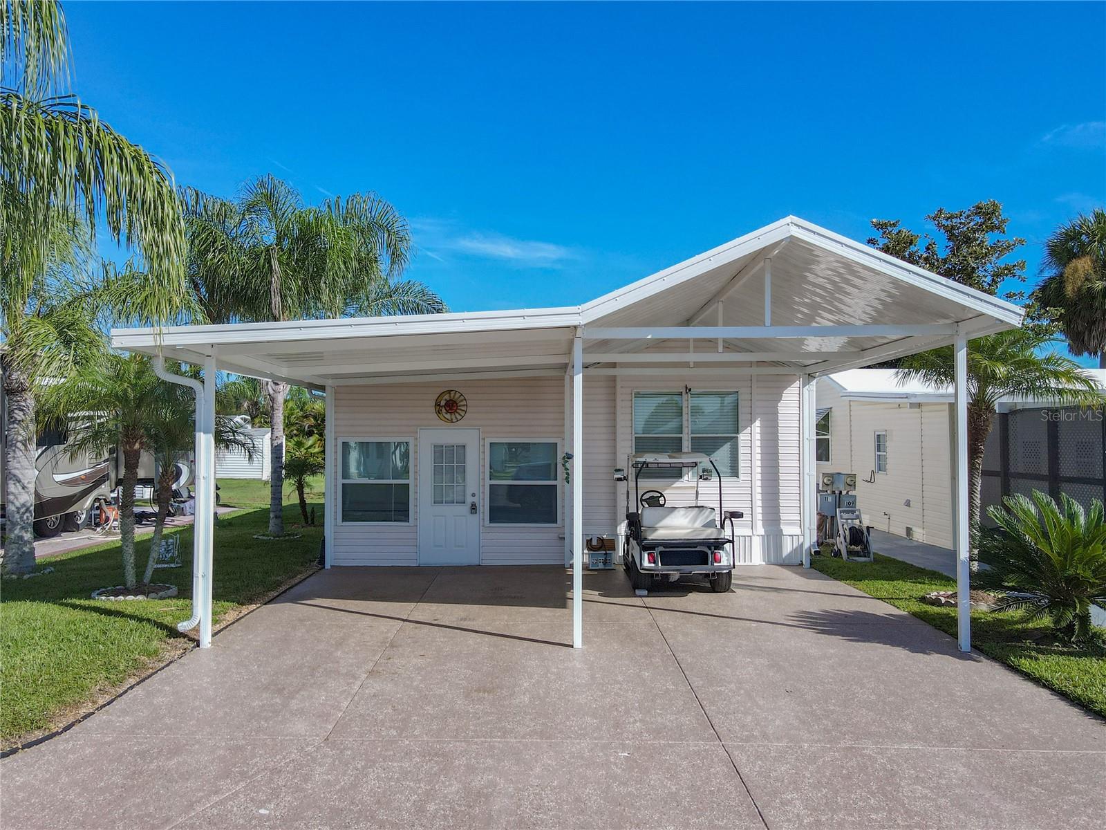 Step into this well-cared-for home where pride of ownership is evident the moment you arrive. Bright, inviting, and thoughtfully updated, this one-bedroom, one-bath residence is designed for both comfort and ease of living.
Inside, you’ll find a welcoming dining area, an efficient kitchen with plenty of storage, and a spacious bathroom. The Florida room is fully finished, providing additional living space perfect for relaxing or entertaining. A large storage/work area includes a washer and dryer, while the covered carport offers shade and convenience.
Located in a sought-after 55+ gated golf course community, this neighborhood delivers more than just a home — it offers a lifestyle. With golf carts welcome, you can cruise to the clubhouse, the pool, or even straight onto the course. Low POA fees cover internet, cable, weekly lawn care, and garbage pickup three times a week, making life here both affordable and stress-free.
The amenities are second to none: an active clubhouse with year-round events and activities, a sparkling pool, pickleball, tennis, shuffleboard, cornhole, and a fully equipped fitness center. Indoors, enjoy the library, billiards room, laundry facilities, and more. During the fall and winter months, the calendar is full of community gatherings, while summer still offers plenty to enjoy.
With underground utilities, paved streets, and a beautifully maintained setting, this property is perfect as a seasonal retreat or a year-round residence. Whether you’re an avid golfer, a social butterfly, or simply looking for a welcoming place to call home, this community delivers it all.