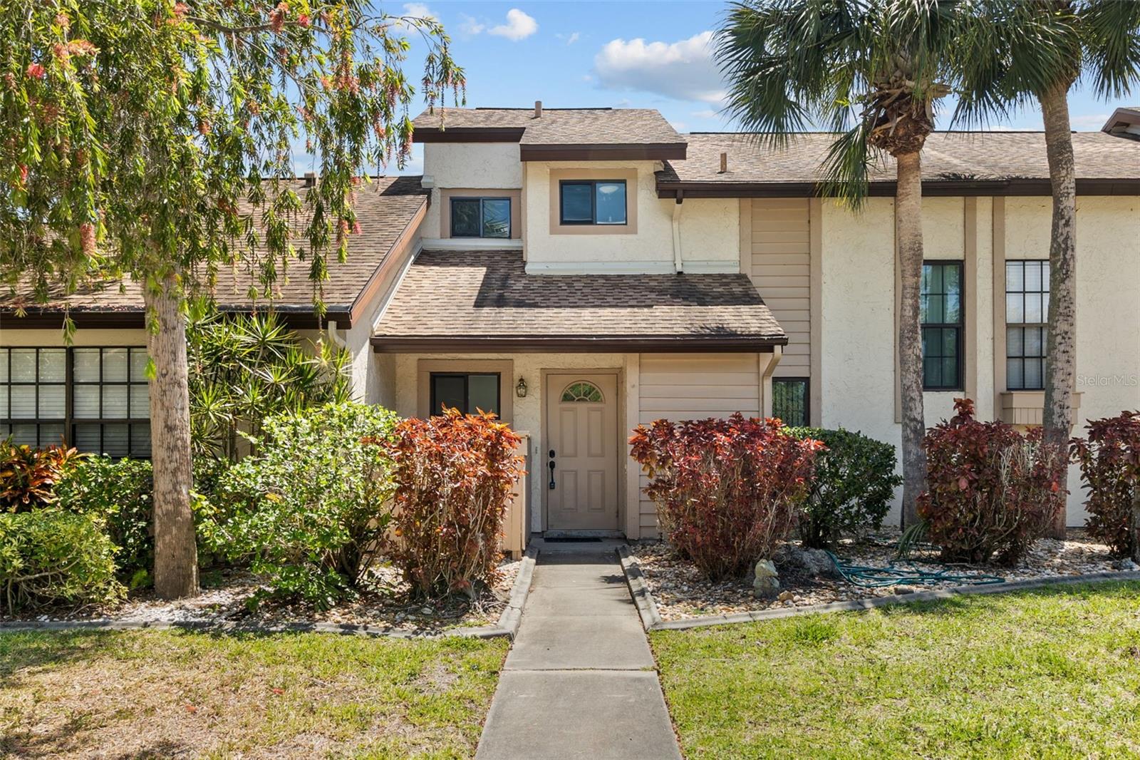 Welcome to maintenance free living in the conveniently located Fairway Villas in North Port, just off US 41. Spend your free time enjoying all the recreation the area offers and leave the yard work to others. This two-story town house will be ready for occupancy after November 1. Home is unfurnished and ready for the next loving family. Lower floor plan features a living room, separate dining room, pass thru kitchen with breakfast bar, half bath and indoor laundry room with washer & dryer. Upgraded appliance package and beautiful quartz counters. Sliding door access from living room to screened lanai. Up the stairs to the second level featuring the main suite with attached bath, guest bedroom and separate guest bathroom. The 2.5 baths have been upgraded with modern touches. Great commuting location. US 41 just moments away and I-75 is a straight shot down Sumter. Dallas White Park and the YMCA are a short stroll away. Sorry no pets permitted.