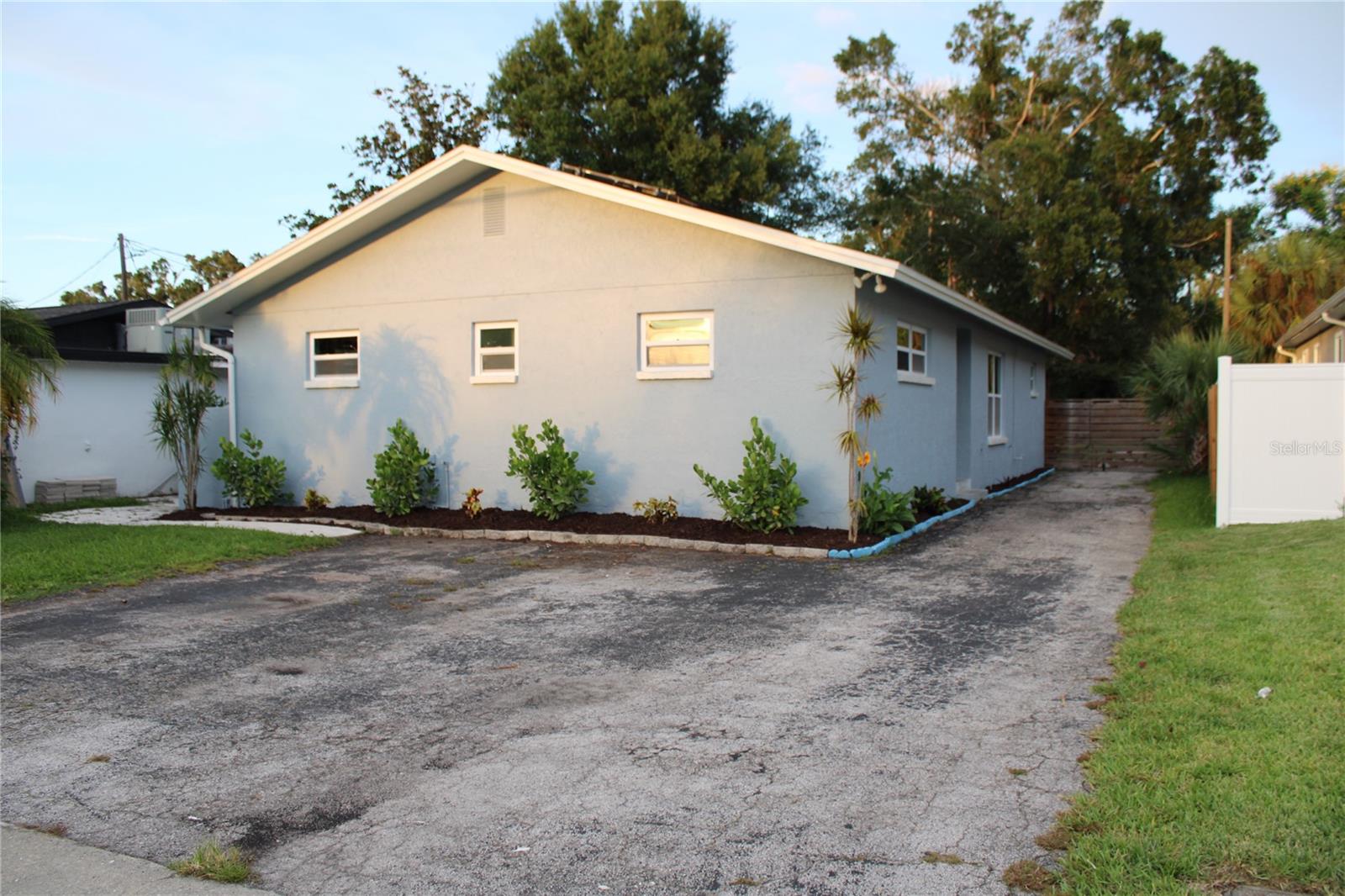 This 3-bedroom, 2-bath block construction home is a gem that blends comfort, efficiency, and versatility. Whether you're looking for a peaceful family haven or a smart investment, this property delivers!
Bonus Room Alert – Easily convert the flex space into a 4th bedroom, office, or even a private in-law suite with its adaptable layout.
Energy Smart Living – Solar panels on the roof help keep electric bills incredibly low, so you can stay cool without burning cash. Recent updates include newer roof, A/C, windows, electrical, and plumbing—major systems already done for you.
The kitchen and both bathrooms feature stone countertops, stainless steel appliances, and ceramic tile throughout for easy maintenance and a polished look.
Step Outside to Paradise – The real showstopper here is the expansive backyard, boasting mature landscaping that offers both beauty and privacy. Whether you're sipping your morning coffee on the large covered rear deck, planning your dream pool, or building a custom garage or guest suite, this outdoor space is full of potential.
No flood zone. Water softener included.
Perfect as a single-family home, a multigenerational setup, or a partial rental—this home’s flexible floorplan adapts to your lifestyle.
Just move in and enjoy, or explore the creative ways to make it uniquely yours.