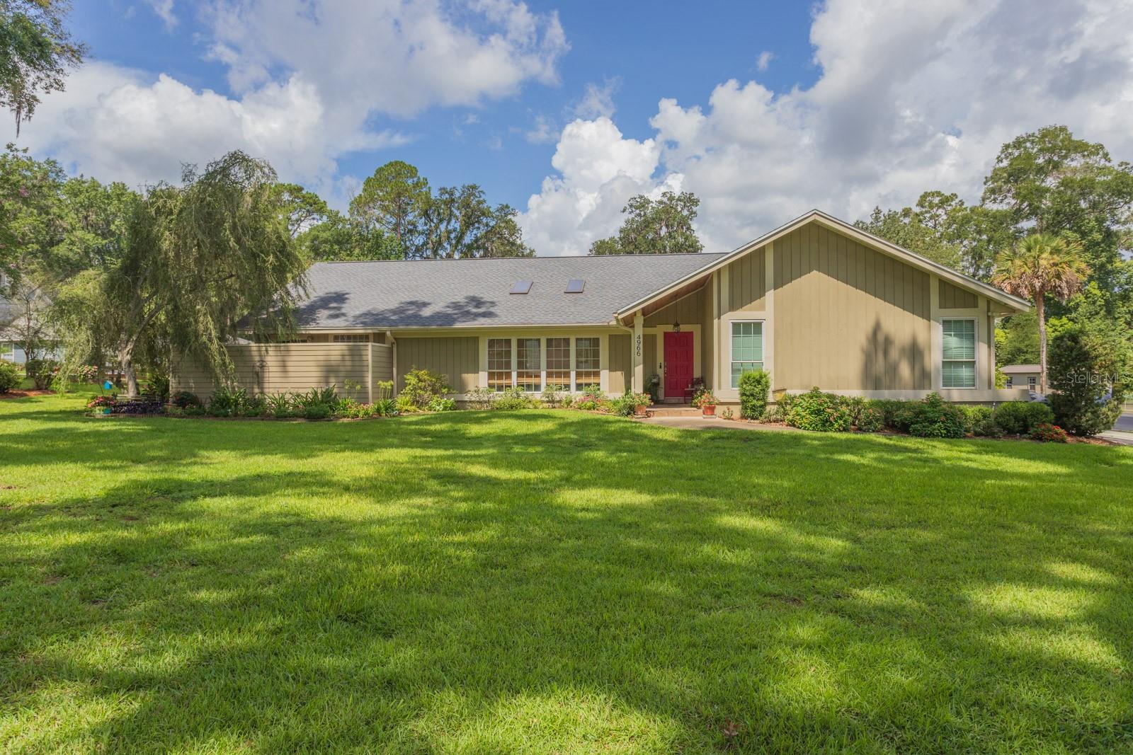Looking for a FOREVER home? Look no further! This home feels like country while minutes from downtown, located on a dead end cul de sac with a total of eight other homes. Not only a secluded location, but 1.0+ acres will make you feel you have your own ranchette. Oh, and by the way, Horses are allowed! Inside the home is full of flexibility. You have 3 bedrooms and 2 baths on one side of the home, with a pocket door for privacy when company is in the house or Babies are sleeping. The open eat-in kitchen allows you to be a part of everything while cooking for the family or dinner party. Separate living room and dining room allows for those formal events with room to spare. The primary bedroom / retreat is located away from the rest of the house allowing maximum privacy with sliding doors that lead out to the relaxing pool. The ensuite in the primary is not only Spa like but has an absolutely awesome atrium that allows in sunlight and nature. All of that and still another half bath for guests and a home Office as well! But wait! There is more! For outside entertaining or simply enjoying family you have an expansive lanai overlooking a beautiful screened in pool! Sit on the lanai and enjoy all a cup of coffee or cocktail while soaking up peace and tranquility. If it is family you want to inspire, there is room to play football, soccer or any other sport your family enjoys! By the way, there is room for a Pickleball court! All of this can be yours so don't wait, make your appointment today to see this hidden gem!!!