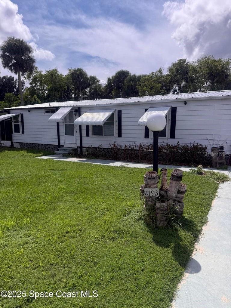 Very nice, modern, quiet, and peaceful setting overlooking a pond and woods. This well-laid-out open floor plan comes furnished and ready to enjoy! Windows and the screened porch feature awnings for comfort and shade. New Metal Roof 6/23. Don't wait—schedule your showing today!