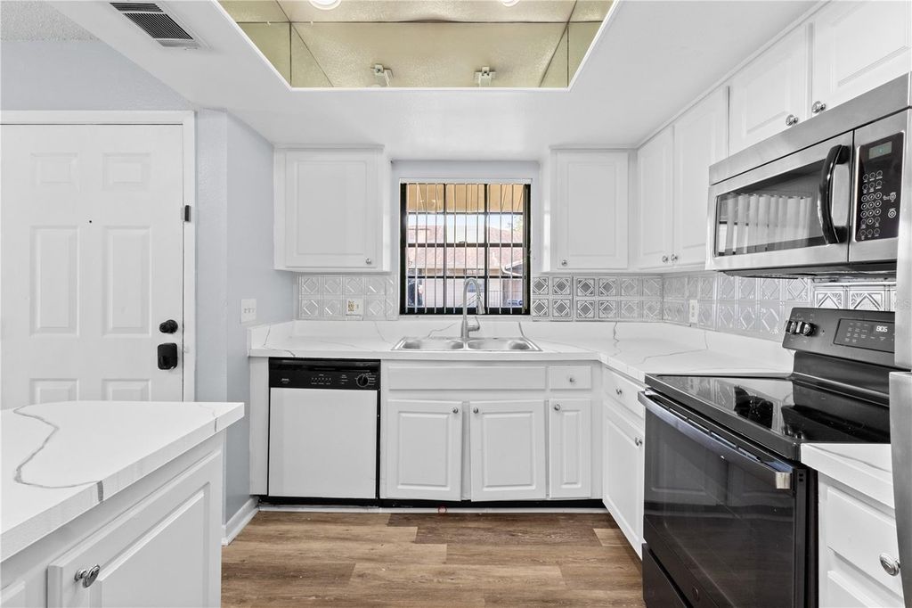 Photo of 4111 Ashford Green Place #B202, Tampa, FL 33613 (MLS # TB8455973)