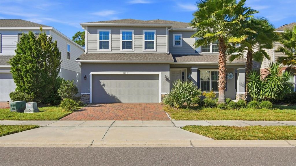 Photo of 17044 Goldcrest Loop, Clermont, FL 34714 (MLS # O6315572)