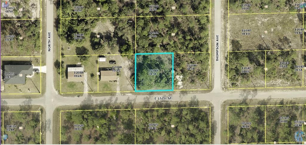 Photo of 1205 E 15th Street, Lehigh Acres, FL 33972 (MLS # O6305028)