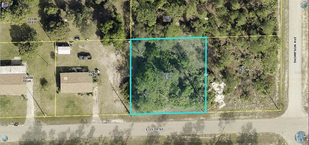 Photo of 1205 E 15th Street, Lehigh Acres, FL 33972 (MLS # O6305028)