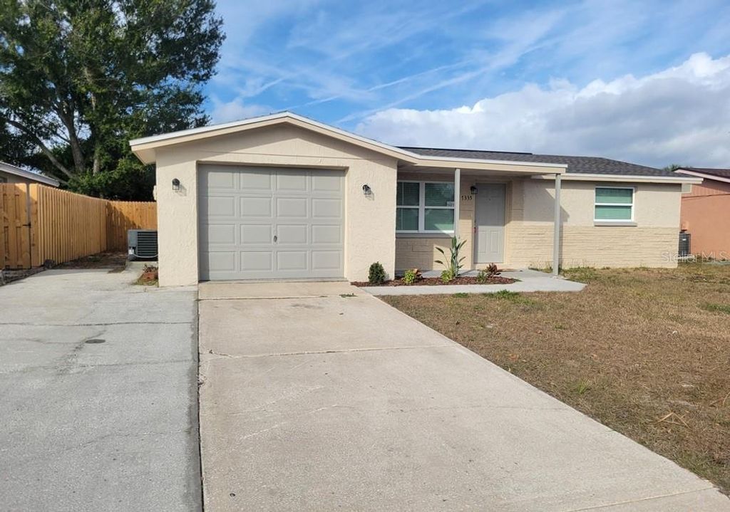 Photo of 7335 Castanea Drive, Port Richey, FL 34668 (MLS # W7881171)