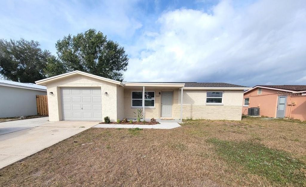 Photo of 7335 Castanea Drive, Port Richey, FL 34668 (MLS # W7881171)