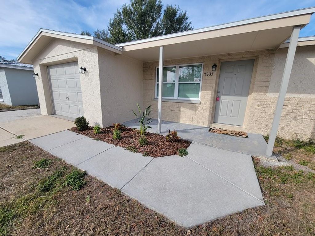 Photo of 7335 Castanea Drive, Port Richey, FL 34668 (MLS # W7881171)