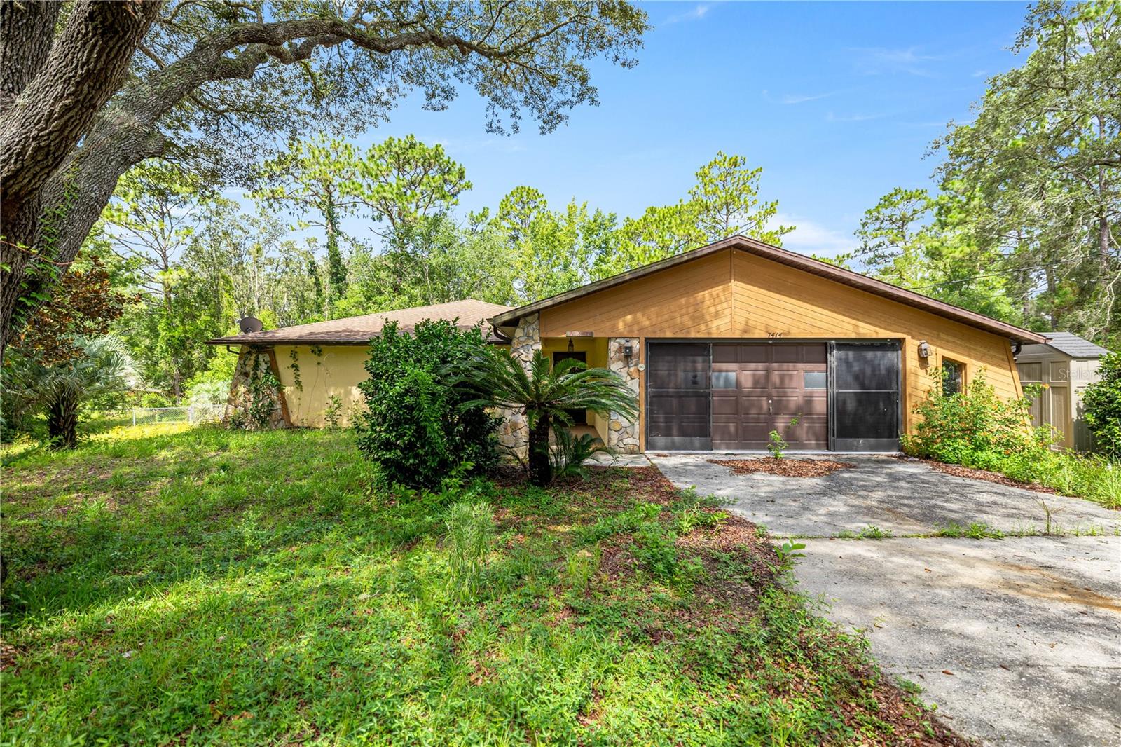 Charming Fixer-Upper with Prime Location and Spacious Layout Opportunity awaits in this 3-bedroom, 2-bath home offering 1,665 square feet of potential in a highly desirable location. Built in 1992, this home features a spacious split floor plan perfect for both everyday living and entertaining. The generously sized living room flows seamlessly into a formal dining space, ideal for hosting family and friends. At the heart of the home, the large kitchen is filled with natural light and includes a cozy breakfast area—just waiting for your personal touch to make it shine. The master suite is a true retreat, complete with a recently remodeled private bath and a walk-in closet for ample storage. Both of these area have access to a covered and screened lanai. Guests will enjoy privacy with two additional bedrooms located on the opposite side of the home, separated by a shared bath and a convenient pocket door to minimize noise. While the home needs updates and essentials like a new roof (currently no leaks), it presents a canvas rich with potential for customization. The screened lanai offers a peaceful spot for morning coffee or evening relaxation and could be refreshed to enhance your outdoor living space. Nestled in an ideal location near shopping, medical facilities, and recreational amenities in every direction, this home is perfect for those with a vision and a desire to create something truly special. Don’t miss this chance to invest in a property with great bones and even greater promise.