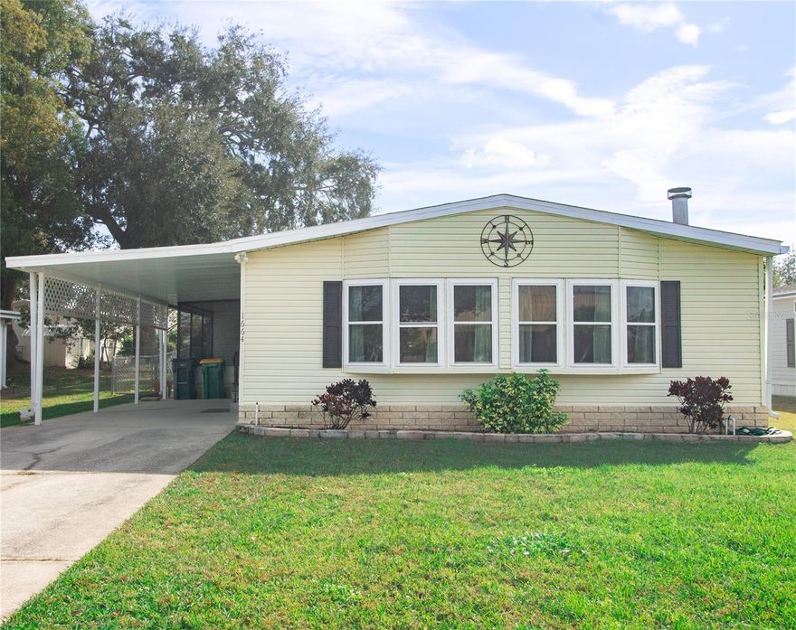 ***** Fully Updated 3-Bedroom Home in Lake Frances Estates – Own Your Land! *****
Welcome to easy Florida living in Lake Frances Estates, a highly desirable 55+ community just 0.6 miles from downtown Tavares. This beautifully updated 3-bedroom, 2-bath manufactured home offers 1,620 sq ft of comfortable living space and the rare benefit of land ownership—no lot rent.

Inside, the home has been fully updated within the last 5 years, starting with a spacious kitchen featuring new cabinets and granite countertops (2020), abundant counter space, and multiple eating areas perfect for entertaining. All kitchen appliances have been replaced within the last five years, making this home truly move-in ready.

The large primary suite is a true retreat, offering a spacious bedroom, walk-in closets, and a generous en-suite bathroom, providing comfort, storage, and privacy.

The main living area is warm and inviting and features a wood-burning fireplace with a vent fan, adding both character and efficient supplemental heating during cooler months.

Major upgrades provide peace of mind, including a new roof, windows, exterior doors, and water heater—all replaced in 2019.

Step outside to enjoy a fully fenced backyard with irrigation, ideal for pets, gardening, or low-maintenance outdoor living. Additional outdoor features include a 160 sq ft screened-in patio, a covered carport with space for both a vehicle and a golf cart, and a connected storage shed complete with an additional refrigerator.

Lake Frances Estates is a golf-cart-friendly, active community centered around its private lake, complete with a boat ramp and dock. Residents enjoy both indoor and outdoor swimming pools, a clubhouse, and a full calendar of social activities—all with a low HOA of just $52 a month.

This is a rare opportunity to own a fully updated home in a vibrant lakefront community close to dining, shopping, and waterfront attractions in downtown Tavares.

Schedule your private showing today and experience the best of relaxed Florida living.